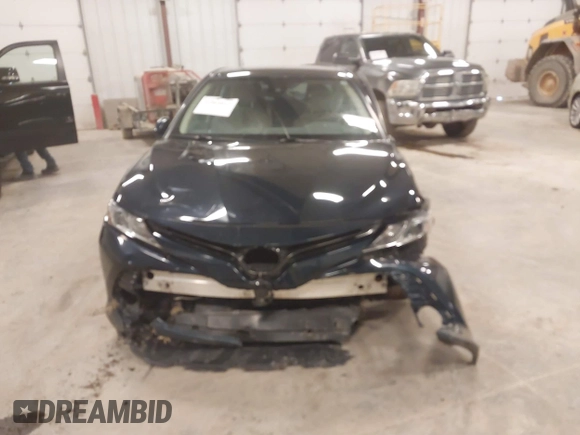 2020 Toyota Camry LE with VIN 4T1C11AK5LU926564, listed as a IAAI auction lot 41864812 with 104,212 mi miles and . Bid and sale history available at carsss.com. Image 6.