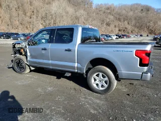 2023 Ford F-150 Lightning Pro with VIN 1FTVW1EL3PWG61686, listed as a Copart auction lot 49578085 with 8,116 mi miles and Salvage Title. Bid and sale history available at DreamBid. Image 2.