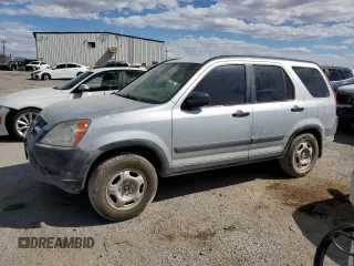 2002 Honda CR-V LX z VIN JHLRD78502C054519, wystawiony jako Copart lot #76317954 z przebiegiem Nie podano mil oraz Czysty tytuł • Clean title. Historia ofert i sprzedaży dostępna na DreamBid. Obrazek 1.
