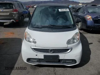 2015 Smart fortwo Passion z VIN WMEEJ3BA5FK812094, wystawiony jako Copart lot #48247405 z przebiegiem 79 913 mil mil oraz Szkody całkowita. Historia ofert i sprzedaży dostępna na DreamBid. Obrazek 5.
