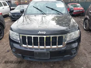 2012 Jeep Grand Cherokee Laredo with VIN 1C4RJEAG0CC316823, listed as a IAAI auction lot 41846479 with 215,317 mi miles. Bid and sale history available at carsss.com. Image 6.