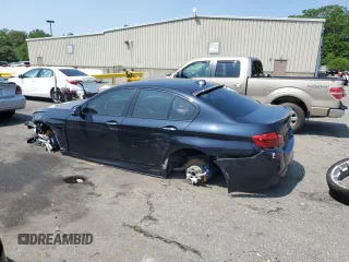 2016 BMW 5 Series 550i xDrive with VIN WBAKP9C52GG587591, listed as a Copart auction lot 58402505 with 94,384 mi miles and Salvage title. Bid and sale history available at DreamBid. Image 2.