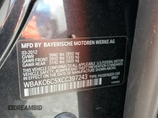 2012 BMW 7 Series 750i xDrive with VIN WBAKC6C5XCC397243, listed as a Copart auction lot 55388715 with 77,424 mi miles and Clean Title. Bid and sale history available at DreamBid. Image 12.