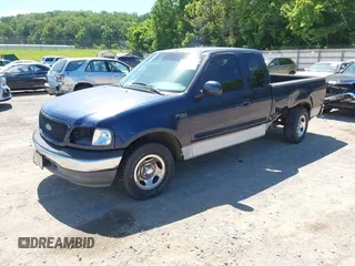 2002 Ford F-150 XL with VIN 1FTRX17282NA39327, listed as a IAAI auction lot 42343066 with Not provided miles and . Bid and sale history available at DreamBid. Image 2.