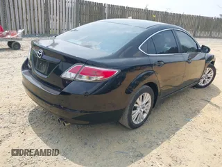 2009 Mazda 6 i Touring with VIN 1YVHP82A595M05140, listed as a IAAI auction lot 42448732 with 176,933 mi miles and . Bid and sale history available at DreamBid. Image 4.