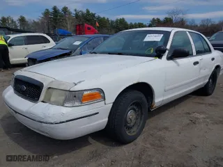 2000 Ford Crown Victoria Police Pkg Police Interceptor with VIN 2FAFP71W6YX169248, listed as a IAAI auction lot 41974053 with 230,658 mi miles. Bid and sale history available at carsss.com. Image 2.