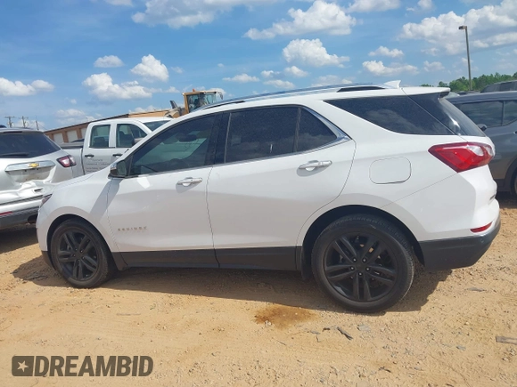 2019 Chevrolet Equinox Premier z VIN 2GNAXPEX9K6177386, wystawiony jako IAAI lot #42172103 z przebiegiem 61 045 mil mil oraz . Historia ofert i sprzedaży dostępna na DreamBid. Obrazek 14.