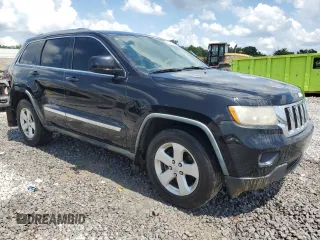 2011 Jeep Grand Cherokee Laredo with VIN 1J4RR4GG6BC538074, listed as a Copart auction lot 60231465 with 203,942 mi miles and Salvage title. Bid and sale history available at DreamBid. Image 4.