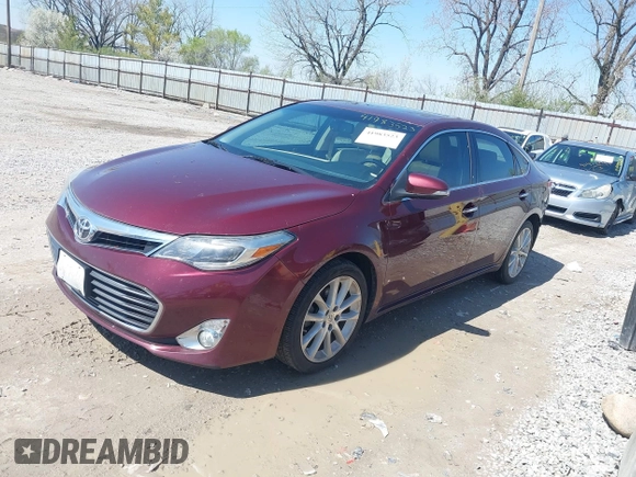 2013 Toyota Avalon XLE with VIN 4T1BK1EB2DU038939, listed as a IAAI auction lot 41983523 with 126,195 mi miles and . Bid and sale history available at DreamBid. Image 2.