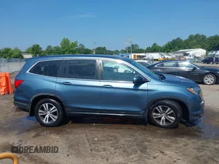 2018 Honda Pilot EX-L with VIN 5FNYF6H52JB050535, listed as a IAAI auction lot 42576721 with 99,280 mi miles and . Bid and sale history available at DreamBid. Image 13.