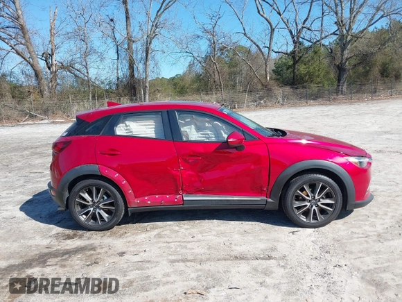 2016 Mazda CX-3 Grand Touring with VIN JM1DKFD72G0129096, listed as a IAAI auction lot 41592893 with 144,860 mi miles. Bid and sale history available at carsss.com. Image 12.