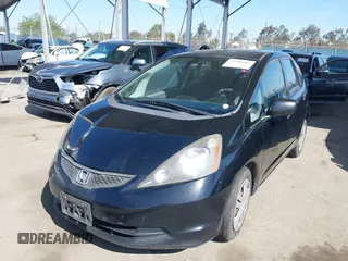 2010 Honda Fit with VIN JHMGE8H28AS012129, listed as a IAAI auction lot 41980485 with 144,170 mi miles. Bid and sale history available at carsss.com. Image 2.