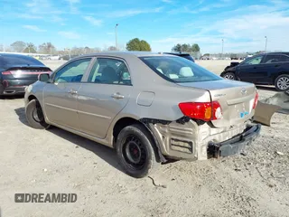 2009 Toyota Corolla with VIN 1NXBU40E19Z051749, listed as a IAAI auction lot 41650985 with 194,158 mi miles. Bid and sale history available at carsss.com. Image 3.