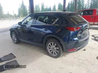 2019 Mazda CX-5 Grand Touring with VIN JM3KFBDM6K0522903, listed as a IAAI auction lot 42583005 with 61,174 mi miles and . Bid and sale history available at DreamBid. Image 3.