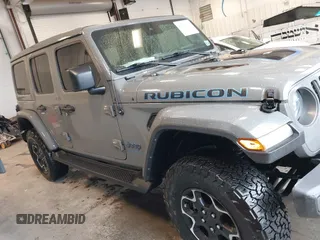 2021 Jeep Wrangler Unlimited Rubicon z VIN 1C4JJXR65MW675010, wystawiony jako IAAI lot #41990021 z przebiegiem 73 406 mil mil oraz . Historia ofert i sprzedaży dostępna na DreamBid. Obrazek 13.