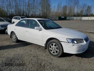 2000 Toyota Camry CE with VIN JT2BG22K0Y0470743, listed as a Copart auction lot 51980385 with 300,464 mi miles and Salvage Title. Bid and sale history available at carsss.com. Image 4.