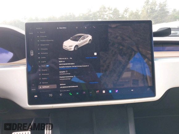 2021 Tesla Model S Long Range with VIN 5YJSA1E57MF428512, listed as a IAAI auction lot 42511020 with 29,611 mi miles and . Bid and sale history available at DreamBid. Image 18.