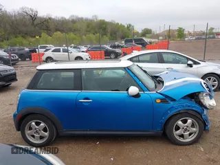 2011 MINI Hardtop with VIN WMWSU3C55BT252427, listed as a IAAI auction lot 42118852 with 151,077 mi miles and . Bid and sale history available at DreamBid. Image 14.