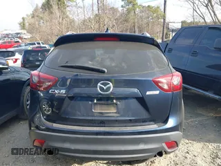 2016 Mazda CX-5 Grand Touring with VIN JM3KE2DY1G0708572, listed as a IAAI auction lot 41685298 with 109,427 mi miles. Bid and sale history available at carsss.com. Image 16.