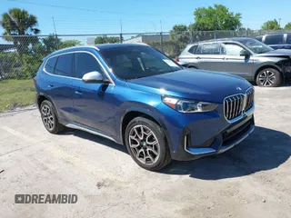 2024 BMW X1 xDrive28i with VIN WBX73EF08R5Z79084, listed as a IAAI auction lot 41823125 with 4,702 mi miles. Bid and sale history available at carsss.com. Image 1.