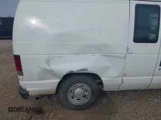 2004 Ford Econoline Cargo with VIN 1FTRE14WX4HA06537, listed as a IAAI auction lot 41745018 with 246,963 mi miles. Bid and sale history available at carsss.com. Image 15.