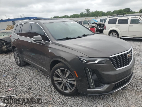 2020 Cadillac XT6 FWD Premium Luxury with VIN 1GYKPCRS4LZ133123, listed as a Copart auction lot 59411115 with 64,463 mi miles and Salvage title. Bid and sale history available at DreamBid. Image 4.