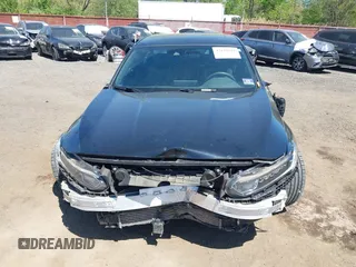 2020 Honda Accord Sport with VIN 1HGCV2F32LA001310, listed as a IAAI auction lot 42144612 with 54,728 mi miles and . Bid and sale history available at DreamBid. Image 12.