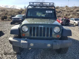 2009 Jeep Wrangler X with VIN 1J4FA24169L707695, listed as a Copart auction lot 49861955 with 89,807 mi miles and Salvage Title. Bid and sale history available at DreamBid. Image 5.