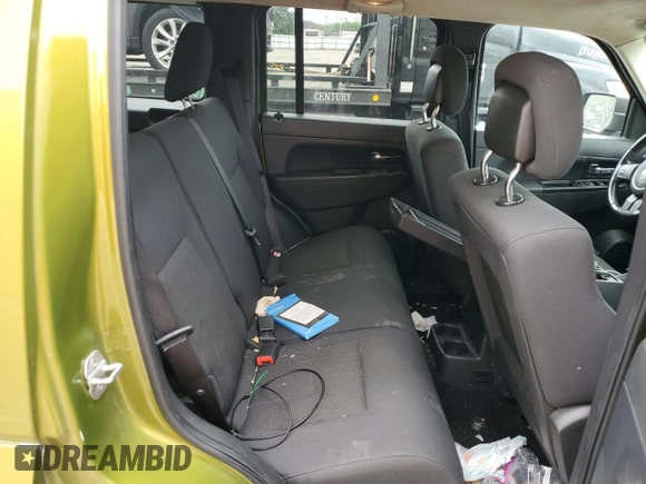 2012 Jeep Liberty Sport z VIN 1C4PJMAK4CW146311, wystawiony jako Copart lot #56643515 z przebiegiem 137 432 mil mil oraz Szkoda całkowita • Salvage title. Historia ofert i sprzedaży dostępna na DreamBid. Obrazek 11.