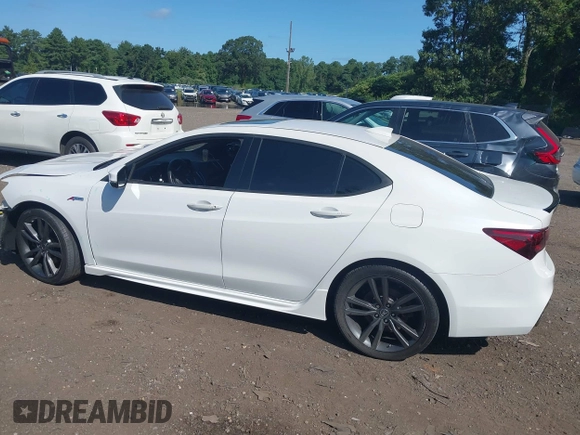 2019 Acura TLX w/A-Spec Pkg z VIN 19UUB2F66KA003762, wystawiony jako IAAI lot #40118141 z przebiegiem 66 341 mil mil oraz . Historia ofert i sprzedaży dostępna na DreamBid. Obrazek 14.