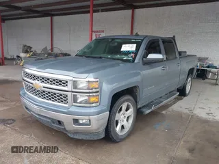 2015 Chevrolet Silverado 1500 LT with VIN 3GCPCRECXFG350382, listed as a IAAI auction lot 42143422 with 173,779 mi miles and . Bid and sale history available at DreamBid. Image 2.