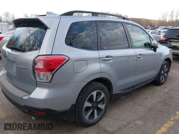 2018 Subaru Forester Premium with VIN JF2SJAEC3JH403764, listed as a IAAI auction lot 41828278 with 84,085 mi miles and . Bid and sale history available at DreamBid. Image 4.