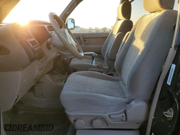 2002 Isuzu Trooper S with VIN JACDJ58X427J08532, listed as a Copart auction lot 84227494 with 166,636 mi miles and Salvage title. Bid and sale history available at DreamBid. Image 7.