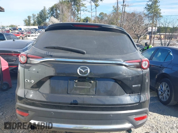 2020 Mazda CX-9 Grand Touring with VIN JM3TCADY8L0405173, listed as a IAAI auction lot 41701533 with 58,119 mi miles and . Bid and sale history available at DreamBid. Image 16.