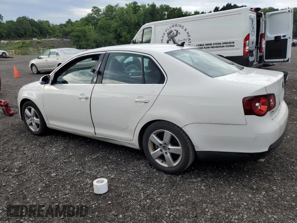 2009 Volkswagen Jetta SE with VIN 3VWRZ71K69M120110, listed as a Copart auction lot 64813905 with 114,552 mi miles and Salvage title. Bid and sale history available at DreamBid. Image 2.
