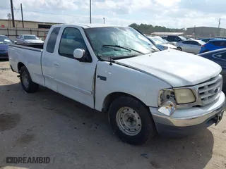 1999 Ford F-150 Work Series with VIN 1FTRX17W1XKA24244, listed as a IAAI auction lot 41512867 with 1 mi miles. Bid and sale history available at carsss.com. Image 1.