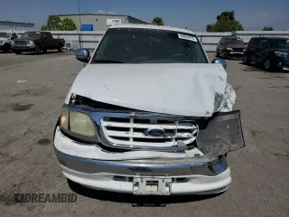 2001 Ford F-150 XLT with VIN 1FTRW07651KC49772, listed as a Copart auction lot 59904815 with 145,639 mi miles and Salvage title. Bid and sale history available at DreamBid. Image 5.