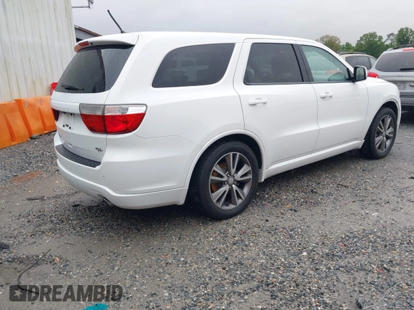 2013 Dodge Durango R/T with VIN 1C4SDHCT6DC672487, listed as a IAAI auction lot 42242172 with 185,074 mi miles and . Bid and sale history available at DreamBid. Image 4.