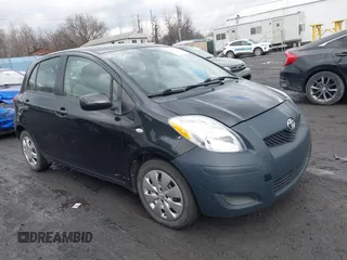 2010 Toyota Yaris with VIN JTDKT4K31A5283852, listed as a IAAI auction lot 41674971 with 197,351 mi miles. Bid and sale history available at carsss.com. Image 1.