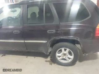 2008 GMC Envoy SLE2 with VIN 1GKDS13S682121604, listed as a IAAI auction lot 41613380 with 166,512 mi miles. Bid and sale history available at carsss.com. Image 6.