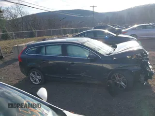 2015 Volvo V60 T5 Premier with VIN YV1612SK9F1263862, listed as a IAAI auction lot 41235823 with 101,303 mi miles. Bid and sale history available at carsss.com. Image 13.