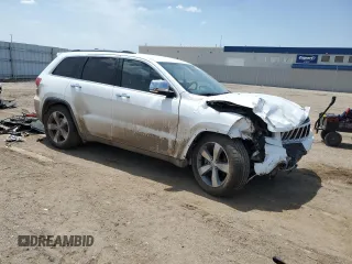 2014 Jeep Grand Cherokee Limited with VIN 1C4RJFBG7EC585151, listed as a Copart auction lot 60458005 with 69,893 mi miles and Salvage title. Bid and sale history available at DreamBid. Image 4.