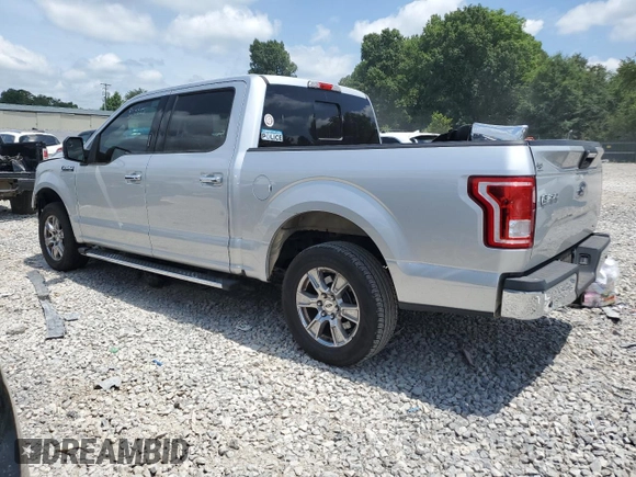 2015 Ford F-150 XL with VIN 1FTEW1CF3FFA48558, listed as a Copart auction lot 62067385 with 151,014 mi miles and Salvage title. Bid and sale history available at DreamBid. Image 2.