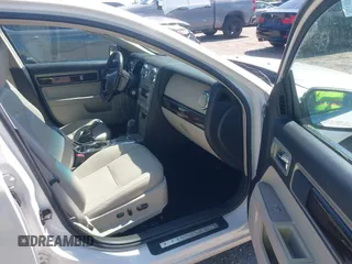 2009 Lincoln MKZ with VIN 3LNHM26T59R610490, listed as a IAAI auction lot 42029239 with 39,539 mi miles and . Bid and sale history available at DreamBid. Image 5.