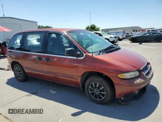1999 Dodge Caravan with VIN 2B4FP25B0XR192013, listed as a Copart auction lot 55006624 with 195,008 mi miles and Salvage title. Bid and sale history available at DreamBid. Image 4.