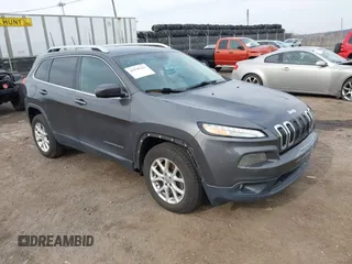 2014 Jeep Cherokee Altitude with VIN 1C4PJMCB3EW297902, listed as a IAAI auction lot 41830261 with 159,610 mi miles. Bid and sale history available at carsss.com. Image 1.
