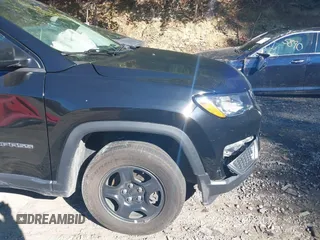 2021 Jeep Compass Sport with VIN 3C4NJDAB9MT591500, listed as a IAAI auction lot 40517034 with 58,230 mi miles and . Bid and sale history available at DreamBid. Image 18.