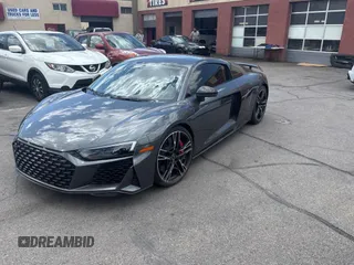 2021 Audi R8 z VIN WUAKBAFX7M7900472, wystawiony jako Copart lot #58422395 z przebiegiem 6493 mil mil oraz Szkody całkowita. Historia ofert i sprzedaży dostępna na DreamBid. Obrazek 2.