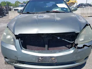 2005 Nissan Altima SL z VIN 1N4AL11D05N911352, wystawiony jako IAAI lot #42132763 z przebiegiem Nie podano mil oraz . Historia ofert i sprzedaży dostępna na DreamBid. Obrazek 10.