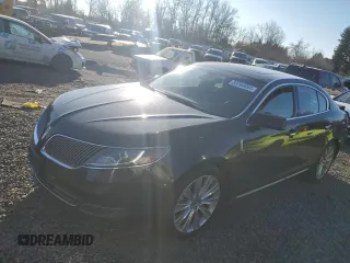 2014 Lincoln MKS EcoBoost z VIN 1LNHL9FT2EG600500, wystawiony jako Copart lot #83764694 z przebiegiem 74 949 mil mil oraz Szkoda całkowita • Salvage title. Historia ofert i sprzedaży dostępna na DreamBid. Obrazek 1.